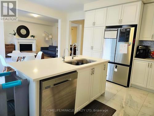 323 Danny Wheeler Boulevard, Georgina, ON - Indoor Photo Showing Kitchen With Double Sink