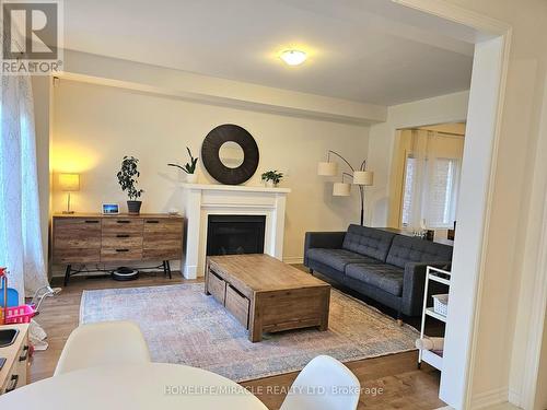 323 Danny Wheeler Boulevard, Georgina, ON - Indoor Photo Showing Living Room With Fireplace