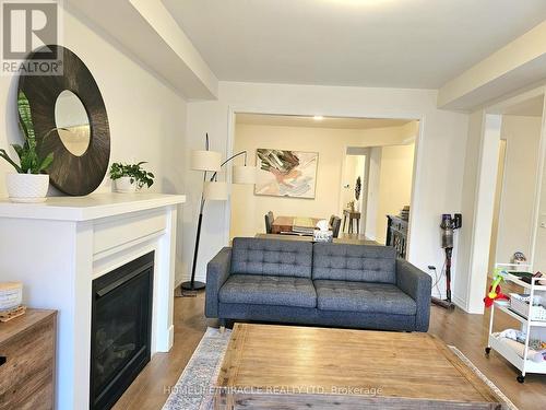 323 Danny Wheeler Boulevard, Georgina, ON - Indoor Photo Showing Living Room With Fireplace