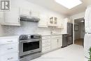 202 - 50 Inverlochy Boulevard, Markham, ON  - Indoor Photo Showing Kitchen 