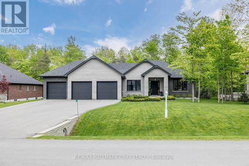 7 Walter James Parkway, Springwater, ON - Outdoor With Facade