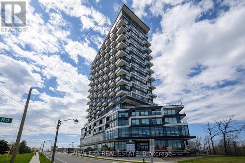 2208 - 297 Oak Walk Drive, Oakville, ON - Outdoor With Balcony With Facade