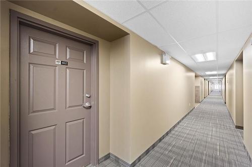 Condo unit entrance, 4th floor hallway - 45 Kingsbury Square|Unit #402, Guelph, ON - Indoor Photo Showing Other Room