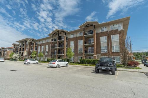 45 Kingsbury Square|Unit #402, Guelph, ON - Outdoor With Balcony With Facade