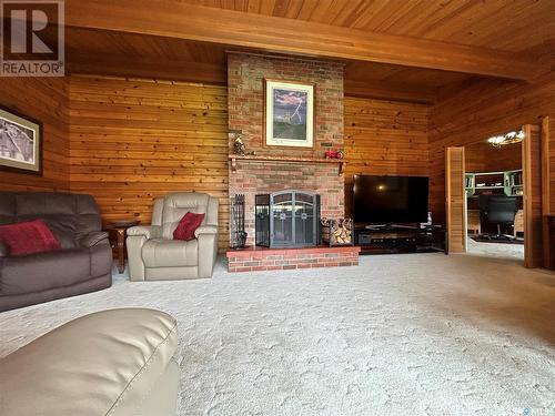 93 Scott Crescent, Weyburn, SK - Indoor Photo Showing Living Room With Fireplace