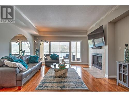 7922 Okanagan Landing Road Unit# 602, Vernon, BC - Indoor Photo Showing Living Room With Fireplace