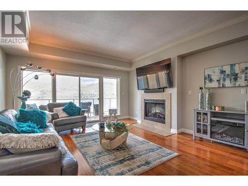 7922 Okanagan Landing Road Unit# 602, Vernon, BC - Indoor Photo Showing Living Room With Fireplace