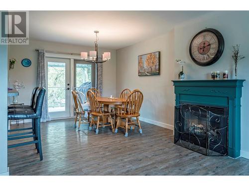 3965 Schubert Road, Armstrong, BC - Indoor Photo Showing Dining Room With Fireplace