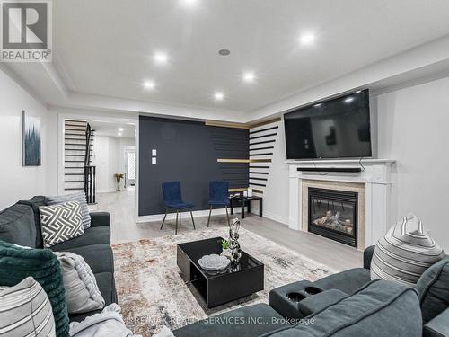 8 River Heights Drive, Brampton (Bram East), ON - Indoor Photo Showing Living Room With Fireplace