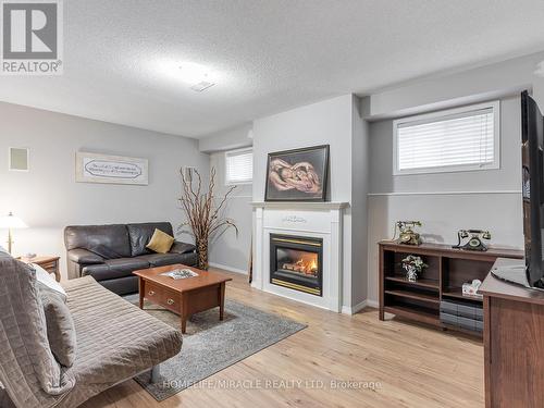 73 Baybrook Road, Brampton, ON - Indoor Photo Showing Living Room With Fireplace