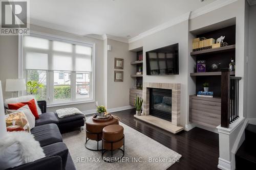 22 - 8307 Kipling Avenue, Vaughan, ON - Indoor Photo Showing Living Room With Fireplace
