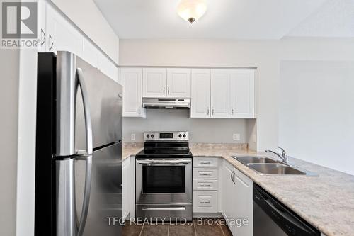 104 - 930 Wentworth Street, Peterborough, ON - Indoor Photo Showing Kitchen With Double Sink