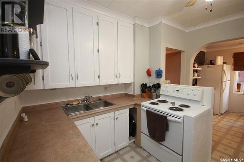 1322 96Th Street, North Battleford, SK - Indoor Photo Showing Kitchen With Double Sink