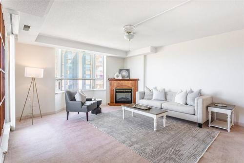 6 Village Green Boulevard|Unit #604, Stoney Creek, ON - Indoor Photo Showing Living Room With Fireplace