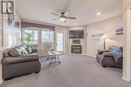 5052 Riverview Road Unit# 5009B, Fairmont Hot Springs, BC - Indoor Photo Showing Living Room With Fireplace