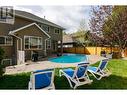 868 Arbor View Drive, Kelowna, BC  - Outdoor With In Ground Pool With Deck Patio Veranda With Backyard 