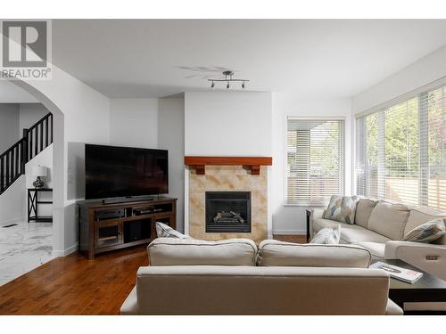 868 Arbor View Drive, Kelowna, BC - Indoor Photo Showing Living Room With Fireplace