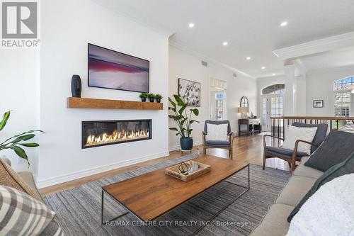 242 East Rivertrace Walk, London, ON - Indoor Photo Showing Living Room With Fireplace