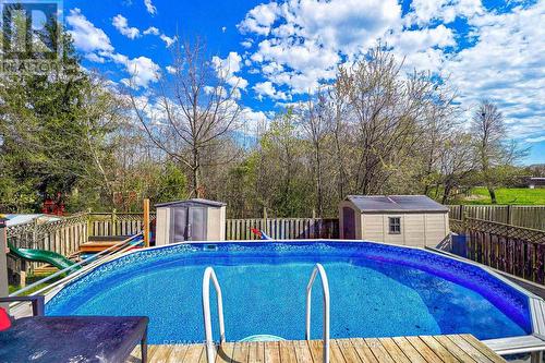 1571 Lewisham Dr, Mississauga, ON - Outdoor With Above Ground Pool With Backyard