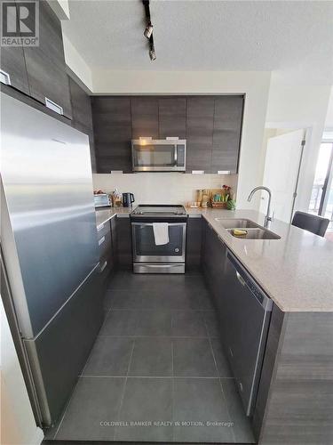 812 - 5033 Four Springs Avenue, Mississauga, ON - Indoor Photo Showing Kitchen With Double Sink With Upgraded Kitchen