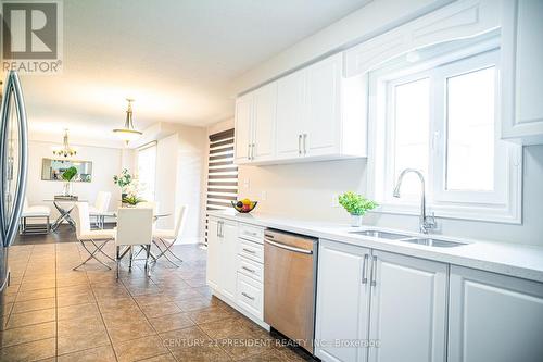 700 Spitfire Street, Woodstock, ON - Indoor Photo Showing Kitchen With Double Sink