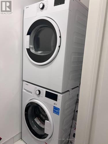 810 - 10 Gibbs Road, Toronto, ON - Indoor Photo Showing Laundry Room