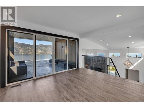 3649 Mckinley Beach Drive, Kelowna, BC - Indoor Photo Showing Other Room With Body Of Water