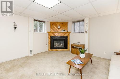 129 Moreau Parkway, Tiny, ON - Indoor Photo Showing Living Room With Fireplace