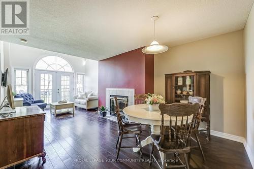 #C-3 -1655 Nash Rd, Clarington, ON - Indoor Photo Showing Dining Room With Fireplace