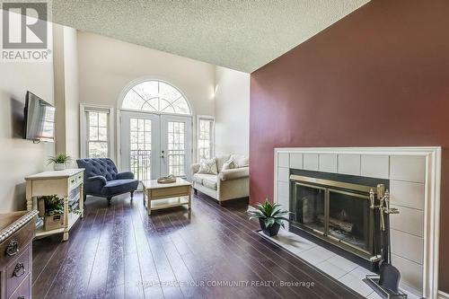 #C-3 -1655 Nash Rd, Clarington, ON - Indoor Photo Showing Living Room With Fireplace