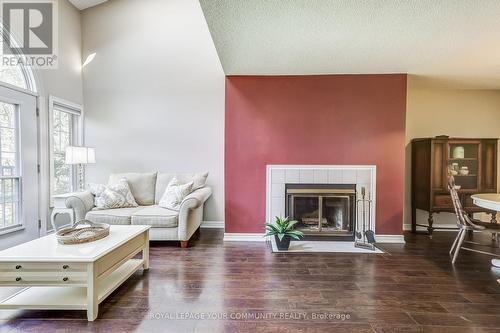 #C-3 -1655 Nash Rd, Clarington, ON - Indoor Photo Showing Living Room With Fireplace