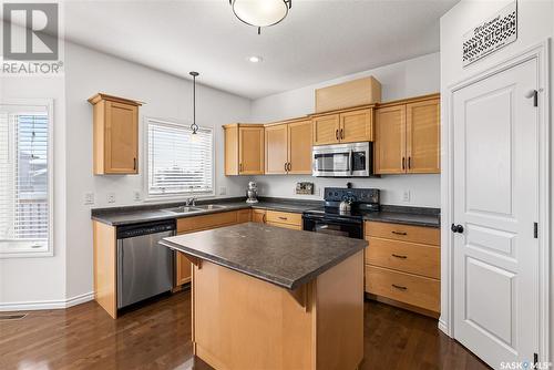 415 Faldo Crescent, Warman, SK - Indoor Photo Showing Kitchen With Double Sink
