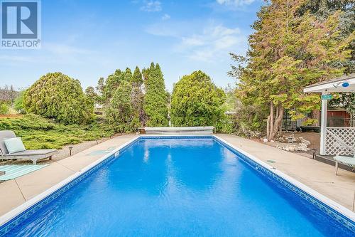 1100 Crown Street, Kelowna, BC - Outdoor With In Ground Pool With Backyard