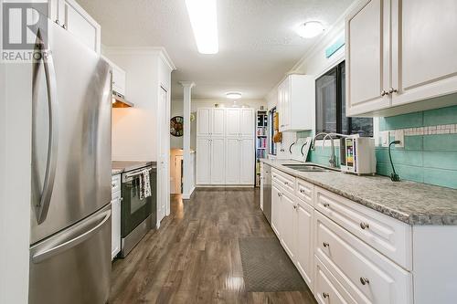 1100 Crown Street, Kelowna, BC - Indoor Photo Showing Kitchen With Double Sink