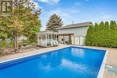 1100 Crown Street, Kelowna, BC - Outdoor With In Ground Pool With Deck Patio Veranda With Backyard