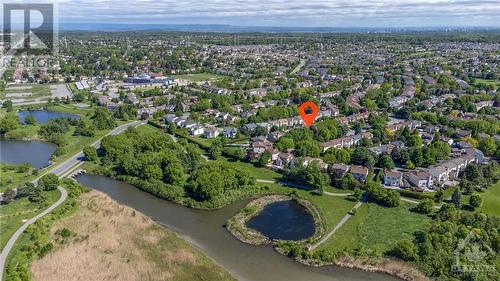 Homes on this tree-lined crescent RARELY become available. With direct access to Meadowbreeze Park, walking trails, great schools & countless amenities, residents never want to leave! - 22 Fernbrook Place, Kanata, ON - Outdoor With View