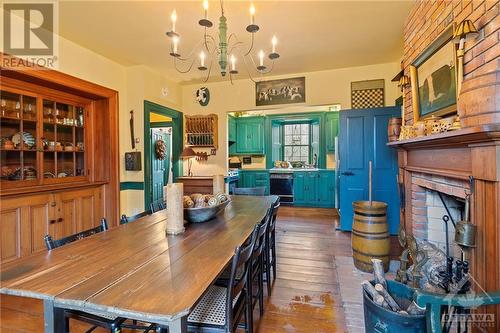 9384 Branch Road, North Augusta, ON - Indoor Photo Showing Dining Room With Fireplace