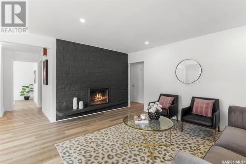 58 Kirk Crescent, Saskatoon, SK - Indoor Photo Showing Living Room With Fireplace