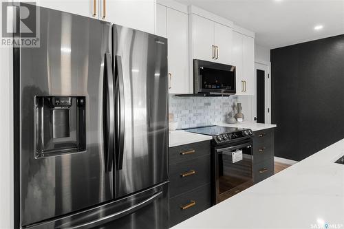 58 Kirk Crescent, Saskatoon, SK - Indoor Photo Showing Kitchen With Stainless Steel Kitchen With Upgraded Kitchen