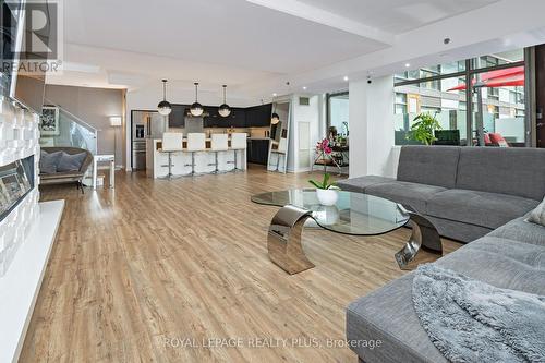 117 - 55 Stewart Street, Toronto, ON - Indoor Photo Showing Living Room With Fireplace