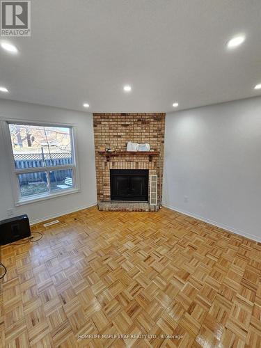 Upper - 82 Stanwell Drive, Brampton, ON - Indoor Photo Showing Living Room With Fireplace