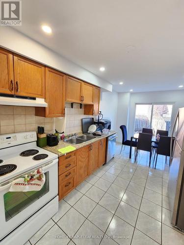 Upper - 82 Stanwell Drive, Brampton, ON - Indoor Photo Showing Kitchen With Double Sink