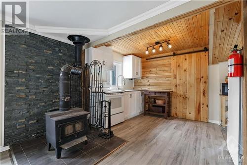 135 Bayview Drive, Constance Bay, ON - Indoor With Fireplace