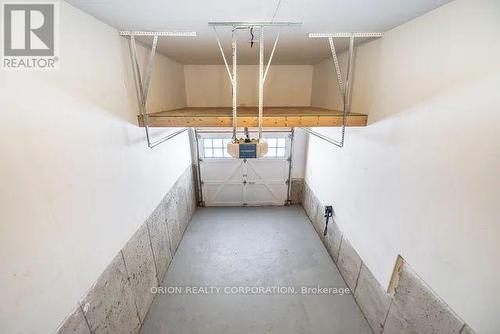 53 Clifford Crescent, New Tecumseth, ON - Indoor Photo Showing Garage