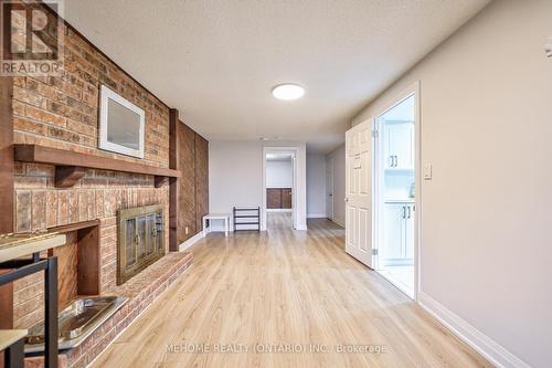 Low-B - 1801 Solitaire Court, Mississauga, ON - Indoor Photo Showing Other Room With Fireplace