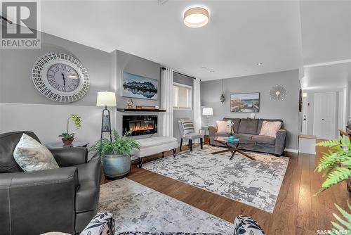 703 Hampton Circle, Saskatoon, SK - Indoor Photo Showing Living Room With Fireplace