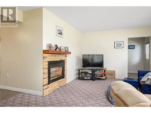 6223 Rimer Road, Vernon, BC - Indoor Photo Showing Living Room With Fireplace