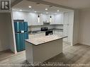107 - 34 Carscadden Drive, Toronto, ON  - Indoor Photo Showing Kitchen With Stainless Steel Kitchen With Upgraded Kitchen 