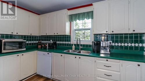 1743 Golf Course Road, Springwater, ON - Indoor Photo Showing Kitchen With Double Sink
