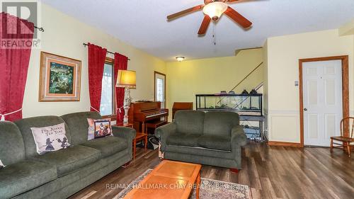 1743 Golf Course Road, Springwater, ON - Indoor Photo Showing Living Room